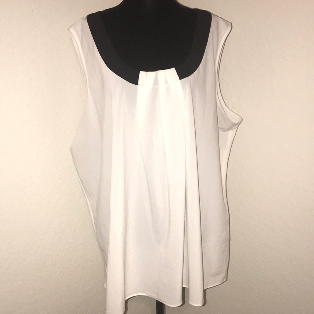 Sleeveless black and white blouse